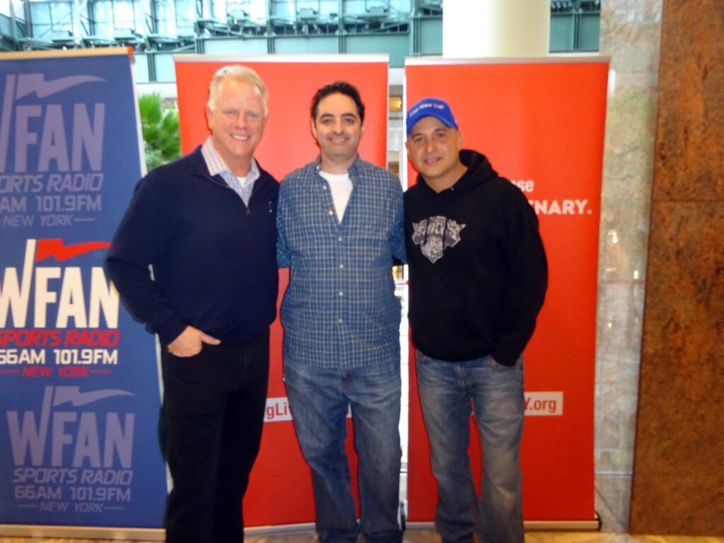Boomer Esiason at a WFAN event in New York, the radio job that drives Boomer Esiason net worth