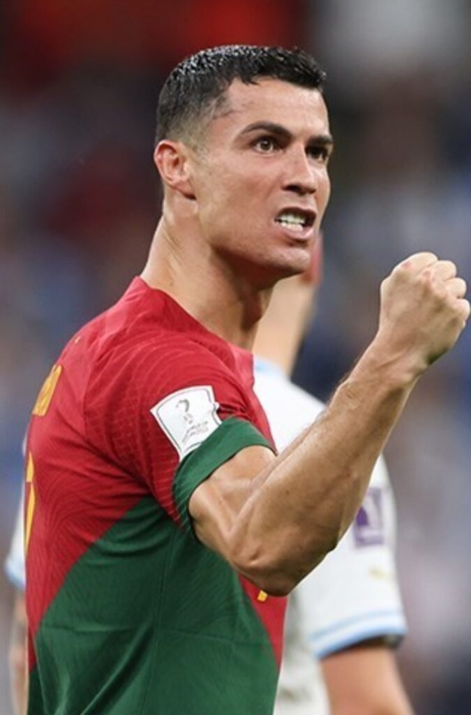Cristiano Ronaldo playing for Portugal at the World Cup, a global stage that grew his net worth