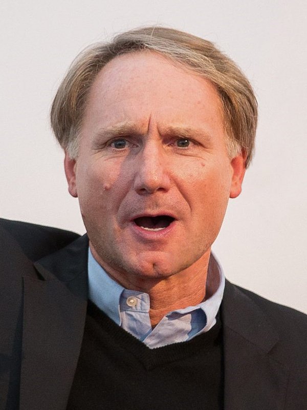 Dan Brown speaking at Web Summit in Dublin, an appearance from the Origin era of Dan Brown net worth