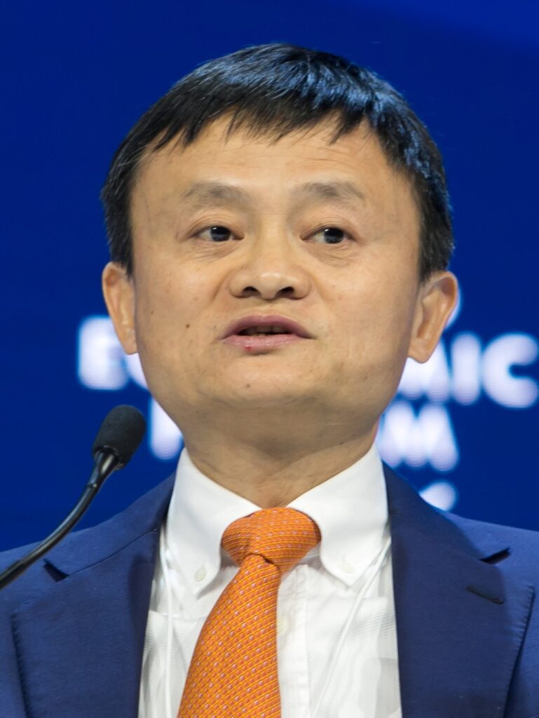 Jack Ma speaking on e-commerce for small businesses at the World Economic Forum in Davos, tied to the Alibaba story behind Jack Ma net worth