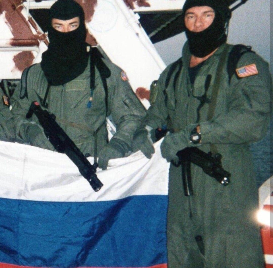 Jocko Willink and a fellow SEAL after boarding the tanker Volga-Neft-147, part of the SEAL career before Jocko Willink net worth