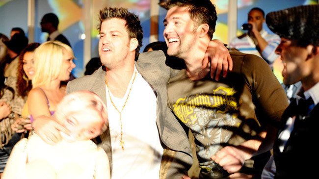 Johnny Bananas with CT Tamburello at the Real World Bash, early in the career behind Johnny Bananas net worth
