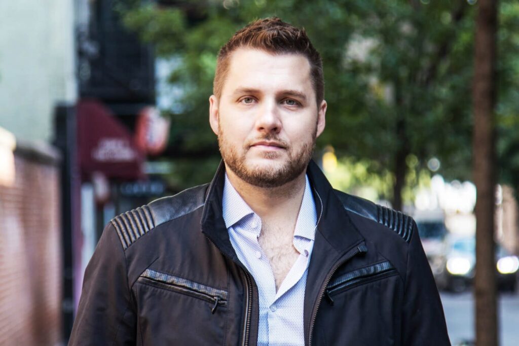Mark Manson author photo, the entrepreneur behind Purpose and Mark Manson net worth