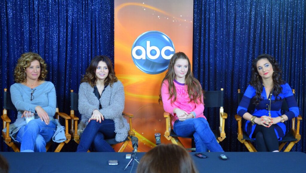 Molly Ephraim (right) with Last Man Standing co-stars at an ABC press event, the sitcom behind most of Molly Ephraim net worth