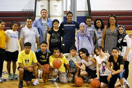 Monica McNutt as a Georgetown player at a youth basketball clinic, before Monica McNutt net worth grew in media
