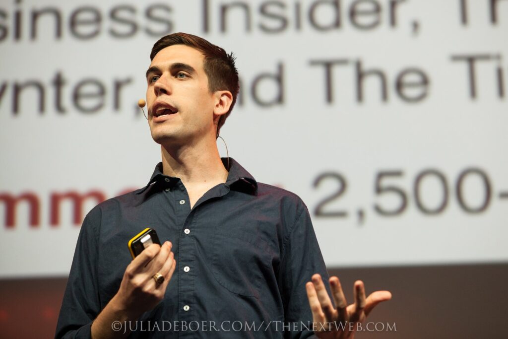 Ryan Holiday speaking on stage, linked to Ryan Holiday net worth from talks